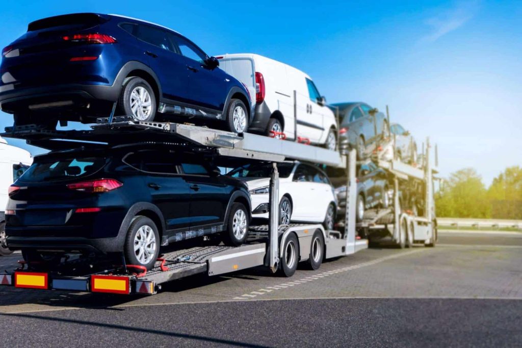 Open trailer auto transportation of new cars Open trailer auto transportation of new cars